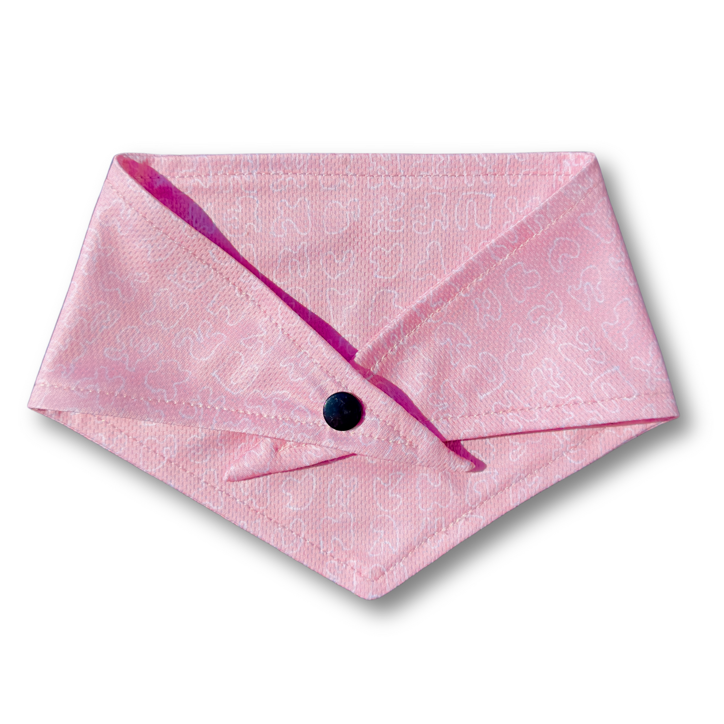 A timeless pink dog bandana with a classic design, perfect for any occasion. Adjustable with tie and button options for a secure and comfortable fit.