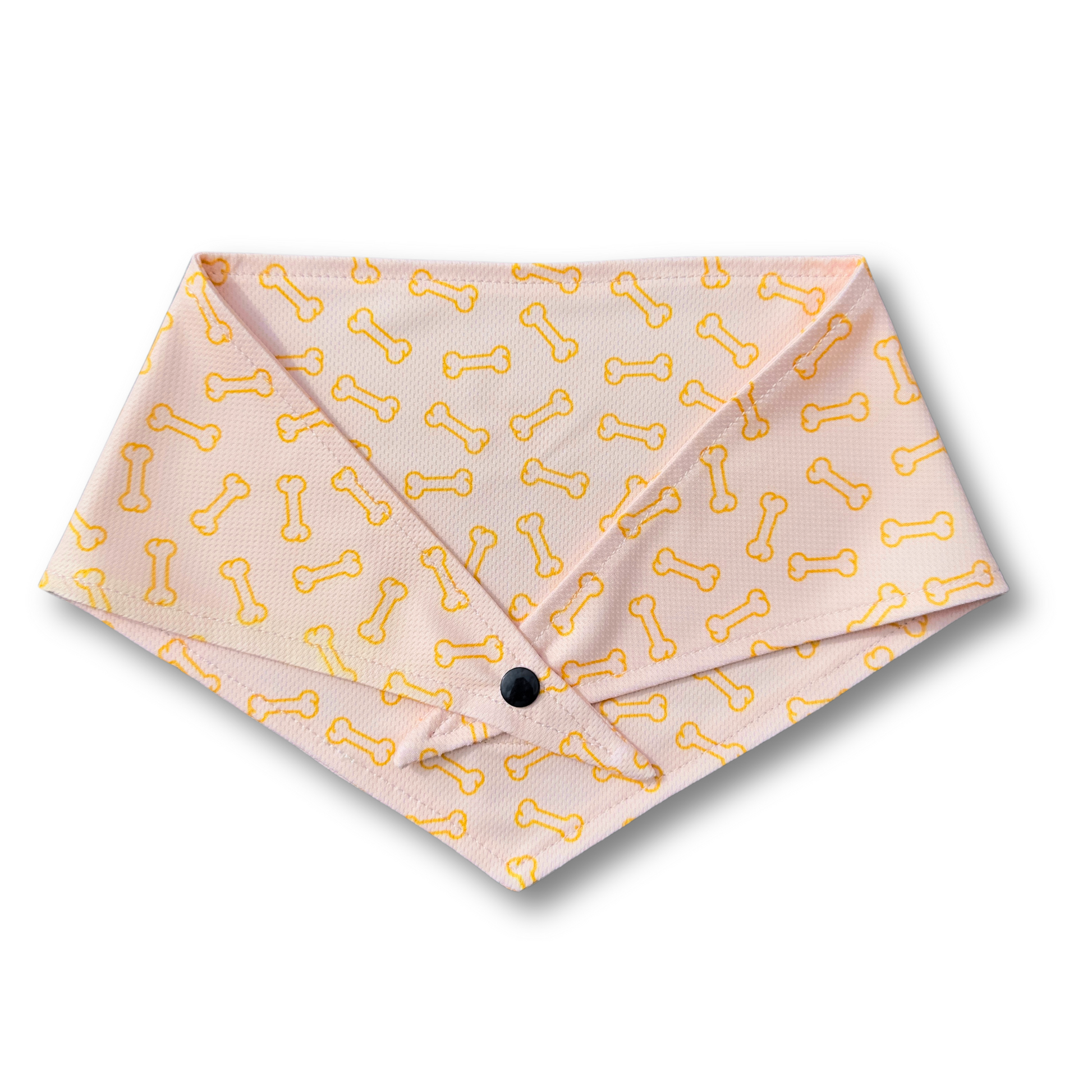 A vibrant orange dog bandana featuring a playful bone pattern. Adjustable with tie and button options for a secure and comfortable fit—perfect for any occasion!