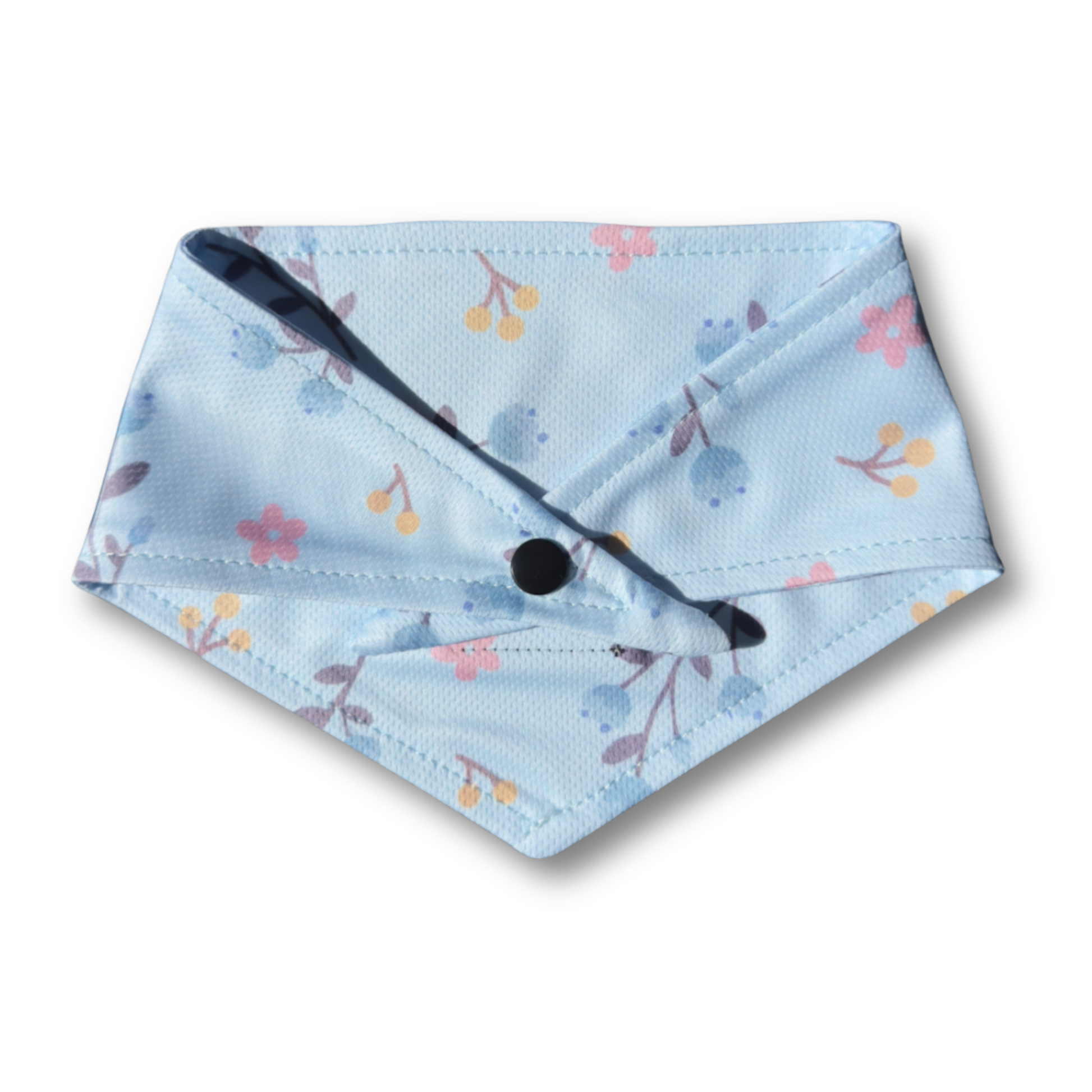 A vibrant floral dog bandana featuring soft, colorful blooms, perfect for spring. Designed for comfort and style, it offers multiple fastening options—tie, button, or both—for a secure and adjustable fit. Ideal for walks, picnics, and adding a fresh touch to your pup’s wardrobe.