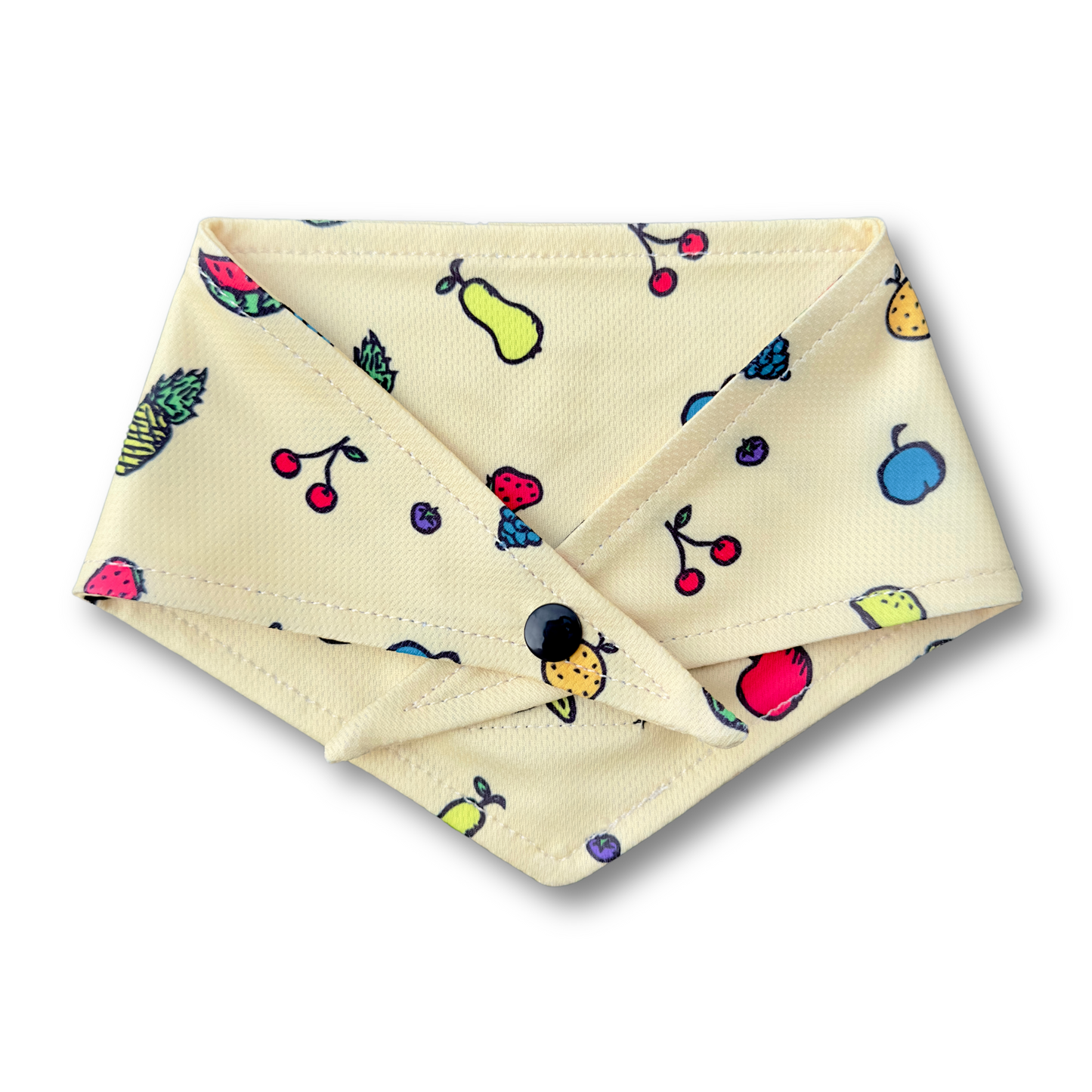 A vibrant, fruit-patterned dog bandana featuring colorful fruit illustrations on a soft fabric. Designed for a secure fit with tie and button options. Perfect for any occasion!