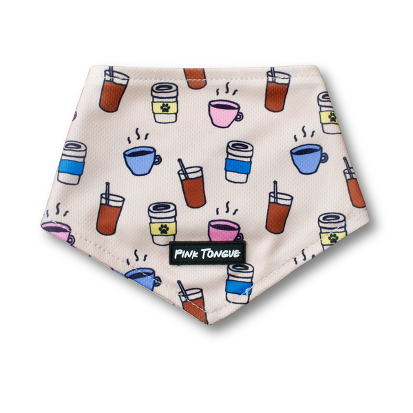 A cozy, coffee-themed dog bandana featuring fun coffee-related designs. Adjustable with tie and button options—perfect for coffee lovers and their stylish pups!