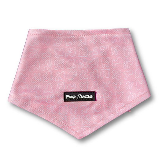 A timeless pink dog bandana with a classic design, perfect for any occasion. Adjustable with tie and button options for a secure and comfortable fit.